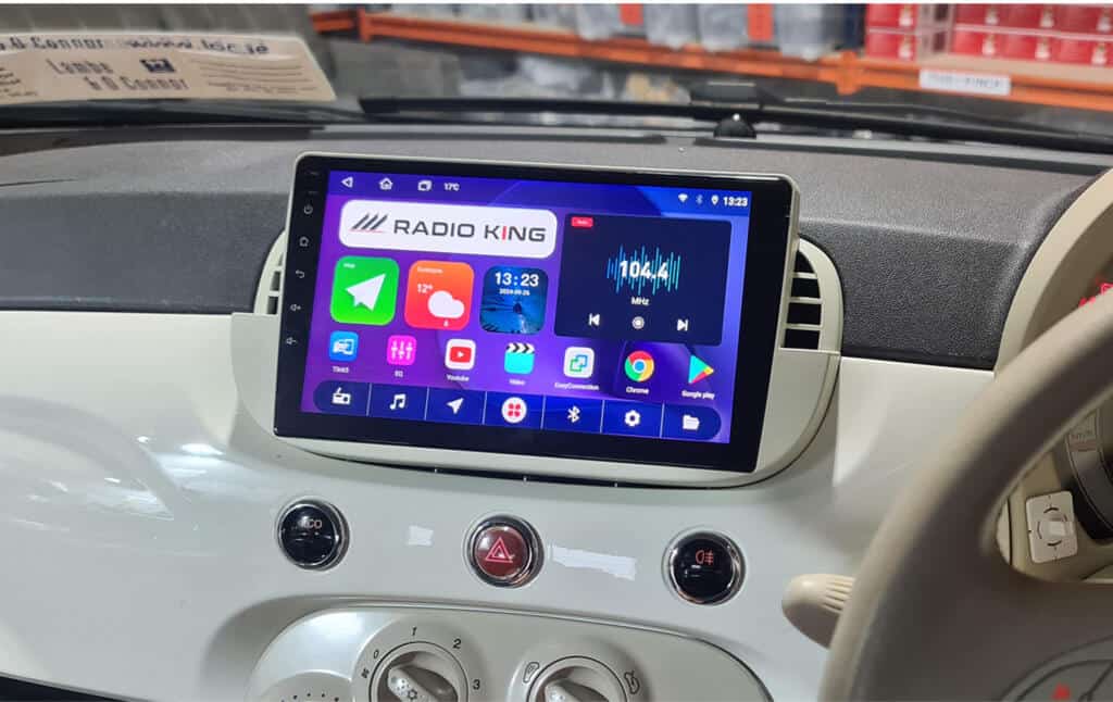 Android car radio screen displaying Radio King Ireland app with Bluetooth, navigation, and multimedia options.