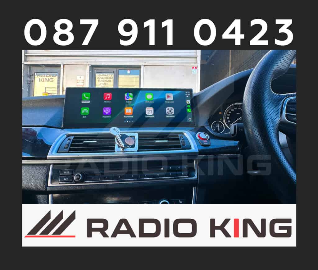 Android car radio with CarPlay system installed in a vehicle dashboard.