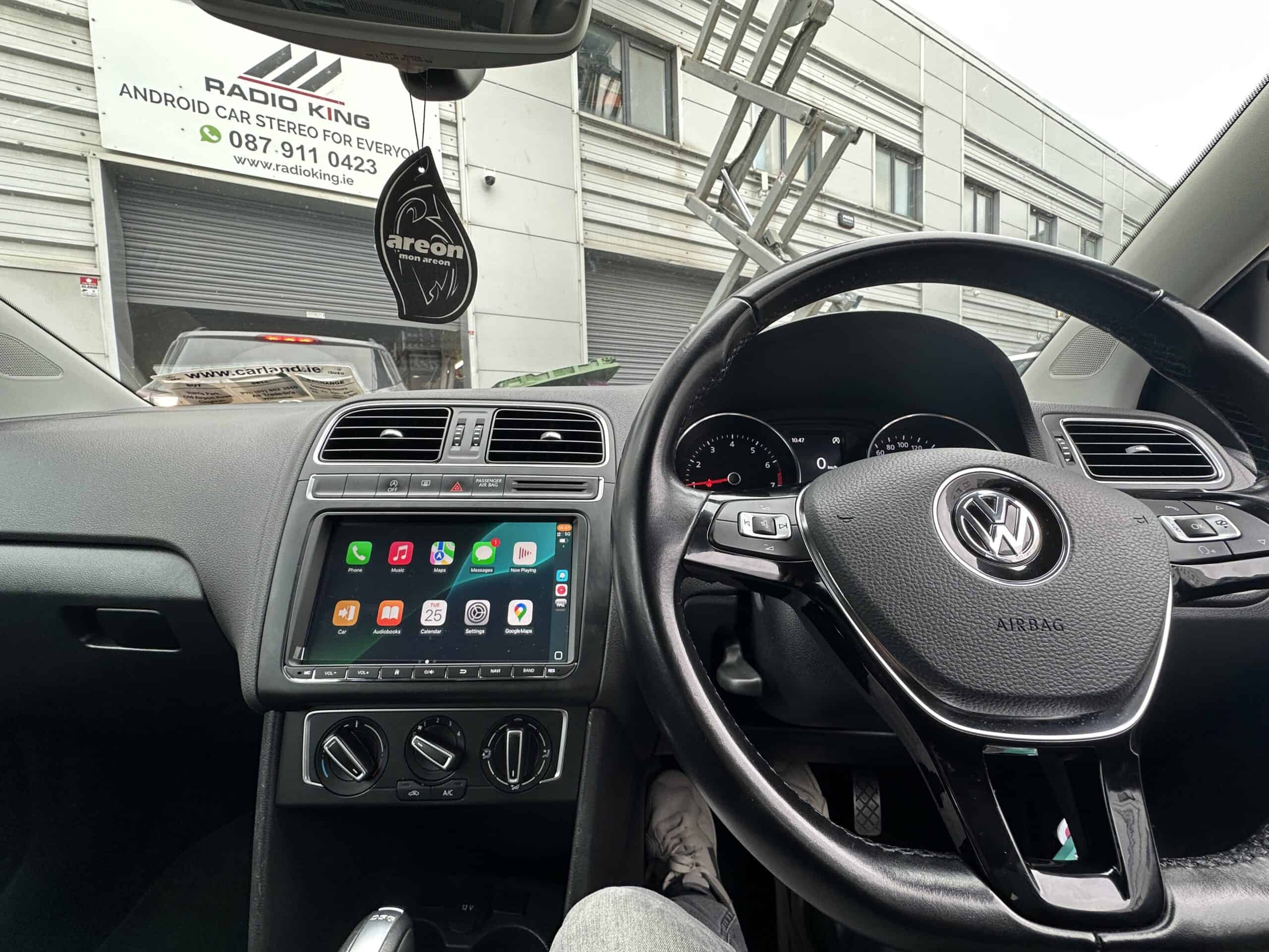 Android car stereo system with CarPlay, installed in a Volkswagen vehicle.