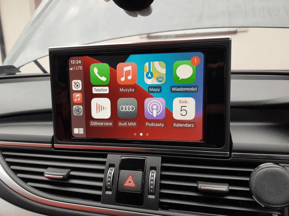 Android Car Radio with CarPlay system on a car dashboard touchscreen.