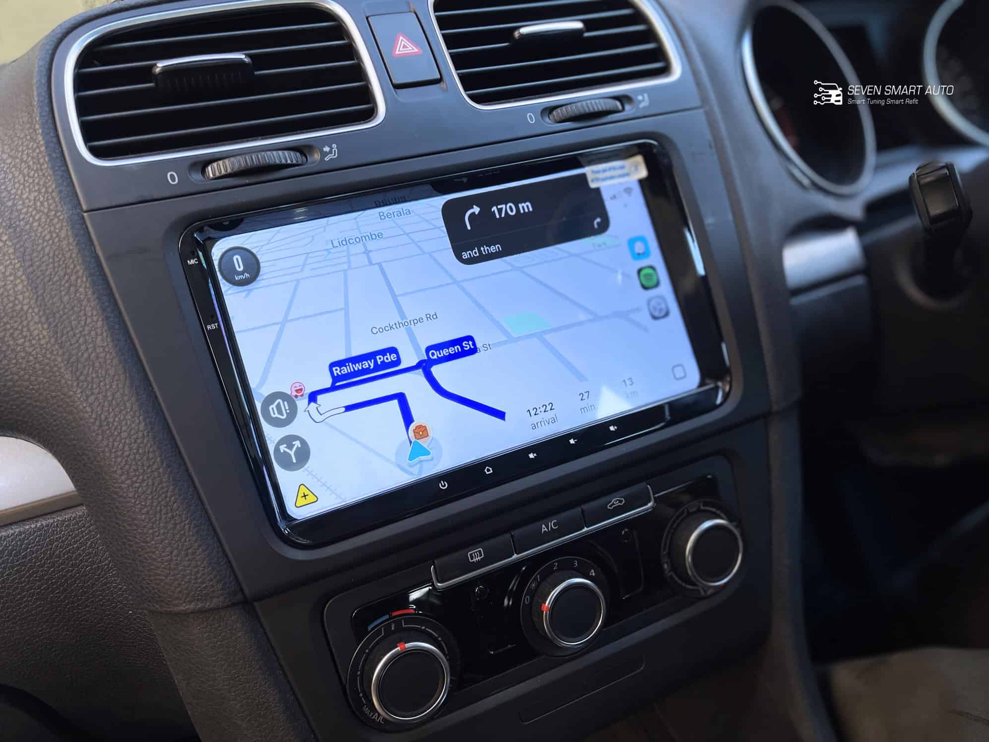 Android car stereo with navigation display in vehicle dashboard.